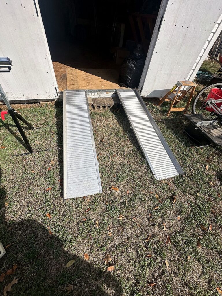Aluminum loading ramps, wood step stool and bicycle