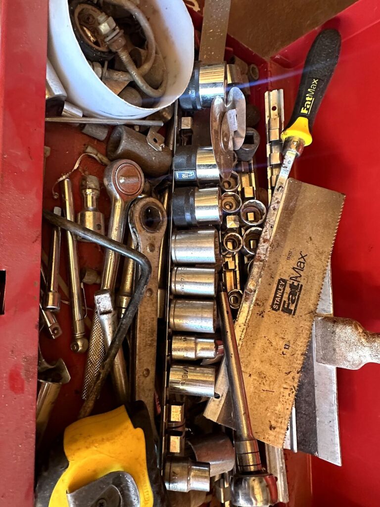 Craftsman tool chest drawer with sockets, ratchets and extensions