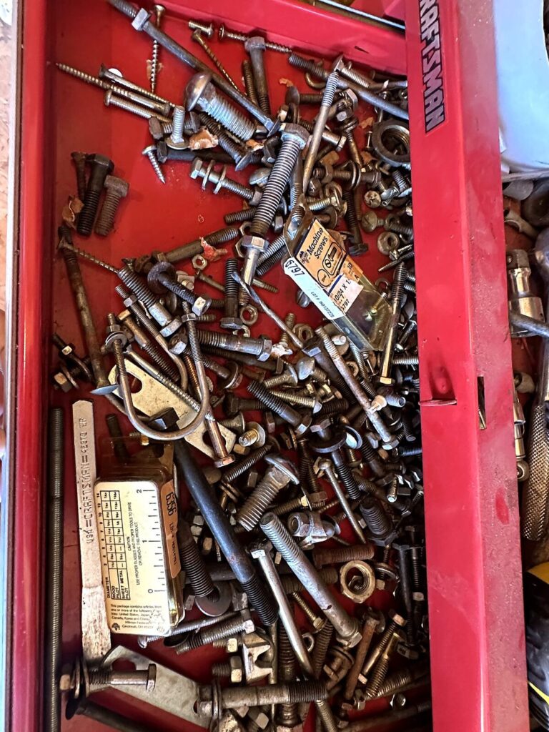 Tool chest drawer with nuts, bolts and screws