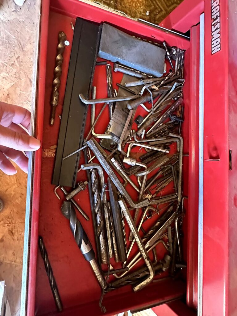 Tool chest drawer with drill bits, Allen keys and square