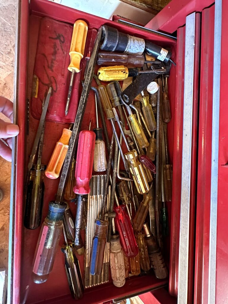 Tool chest drawer full of screwdrivers
