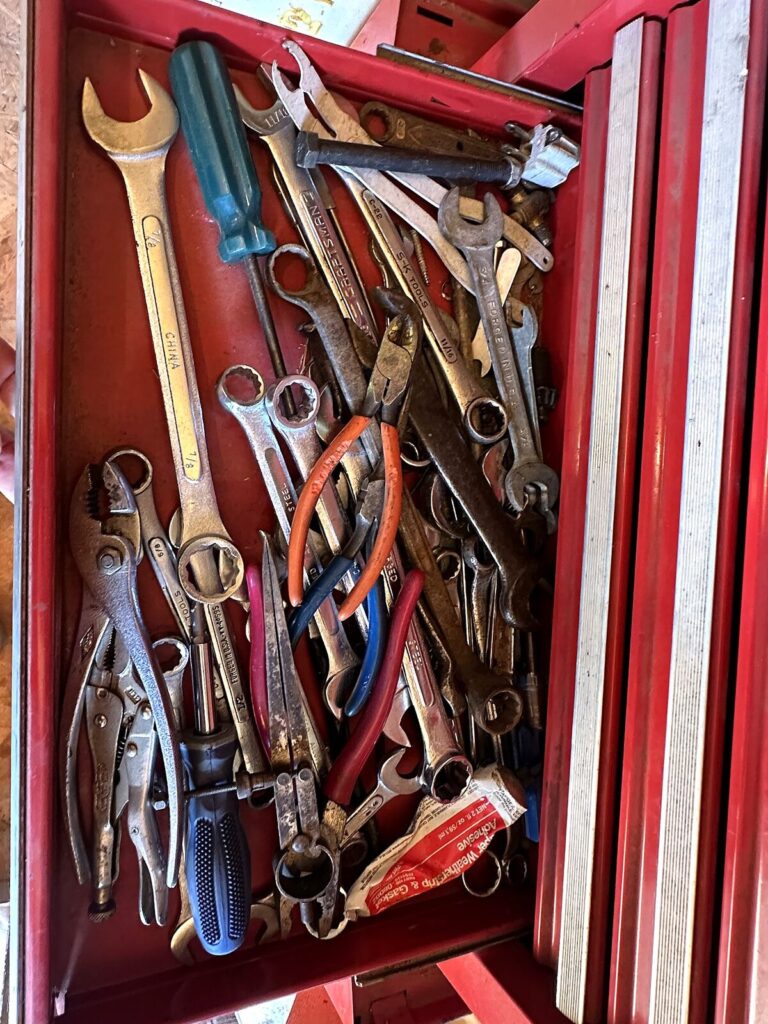 Tool chest drawer with combination wrenches, pliers and Vise-Grips