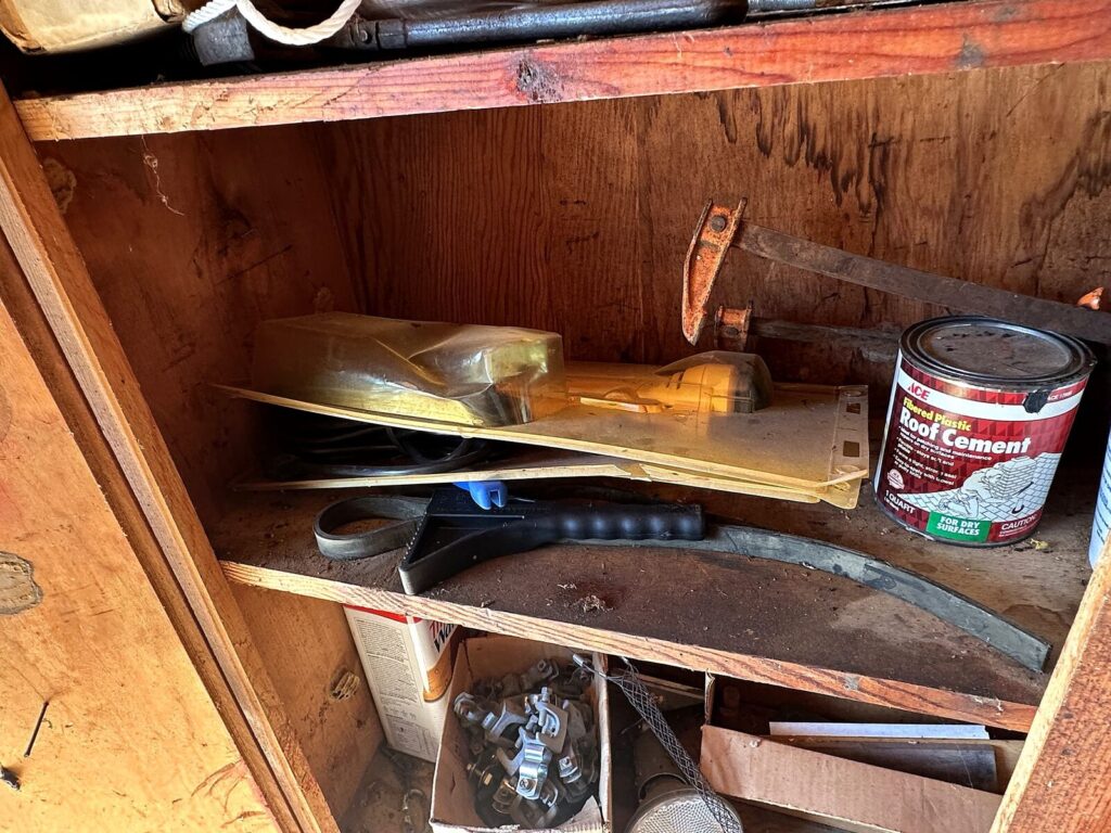Roof cement, caulk gun, fan belt and shop supplies
