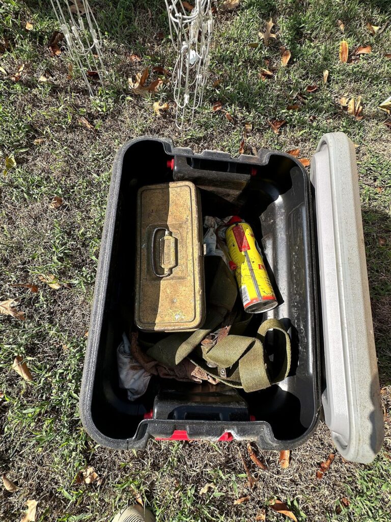 Storage tote with metal tackle box and ratchet straps