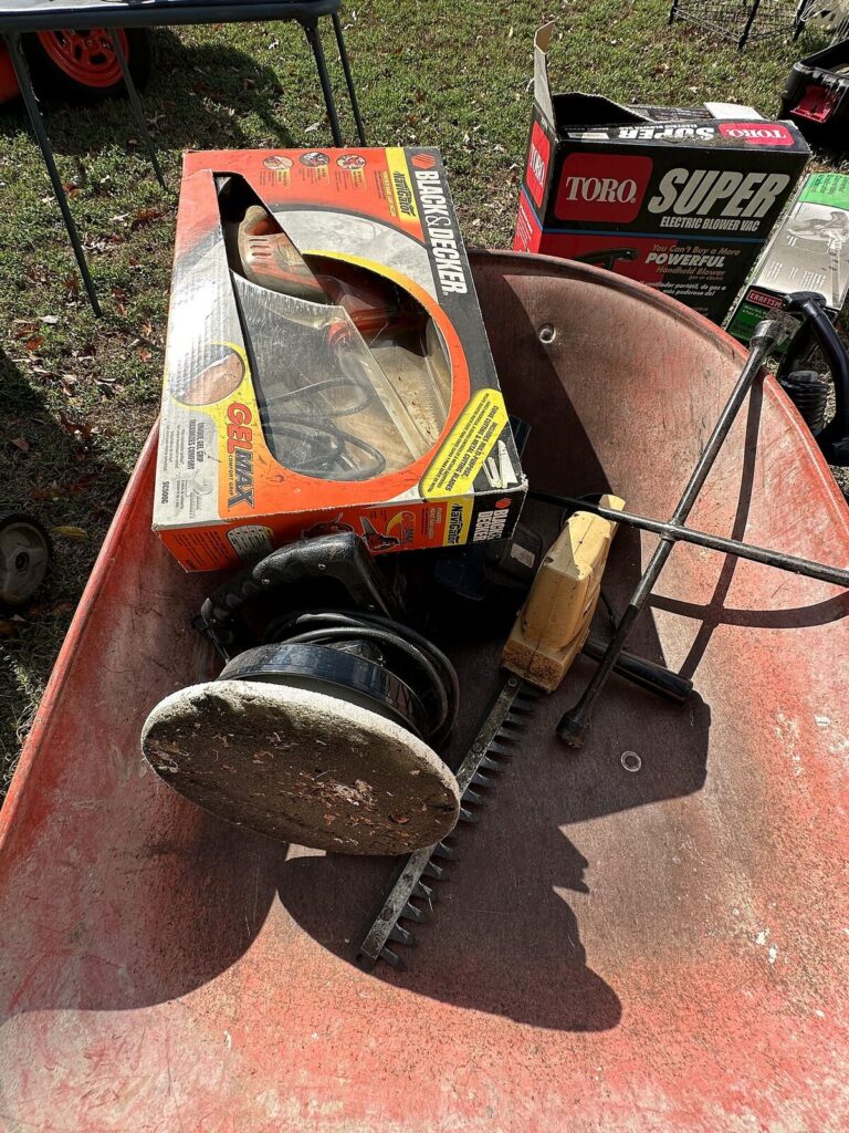 Black & Decker car polisher in box, hedge trimmer and lug wrench