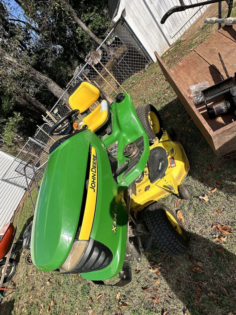 Homemade wood-bed yard cart, pole pruner and ratchet straps