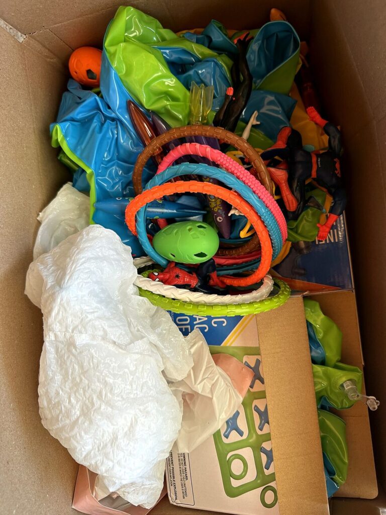 Box of pool toys