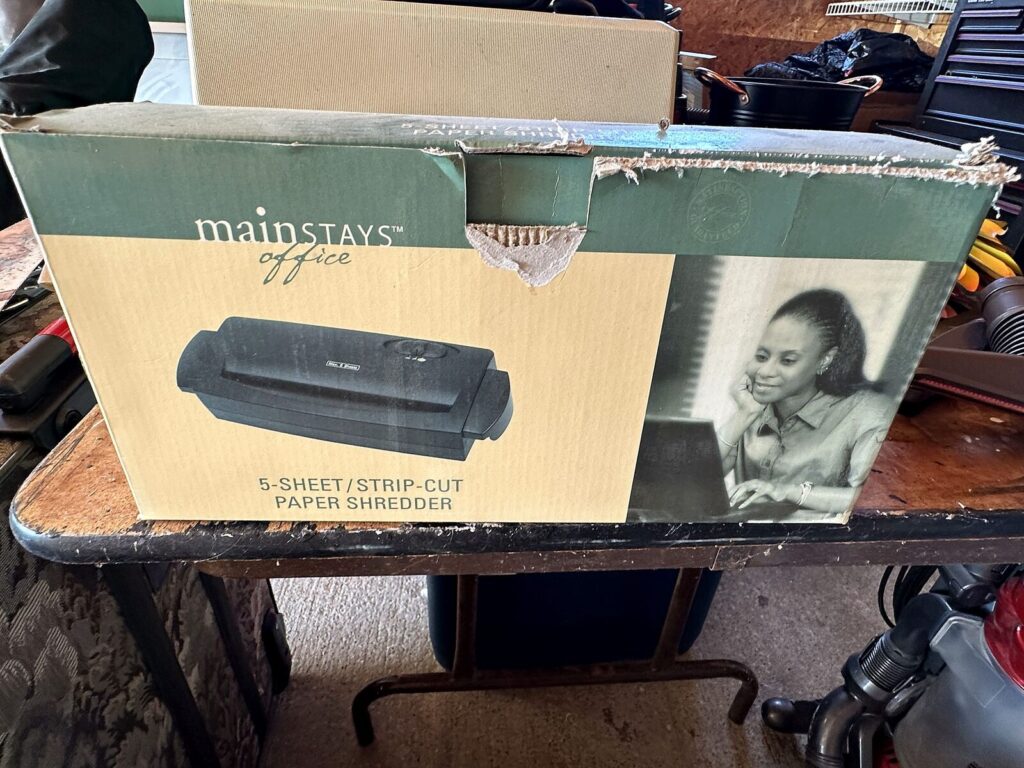 Mainstays paper shredder in box and folding table