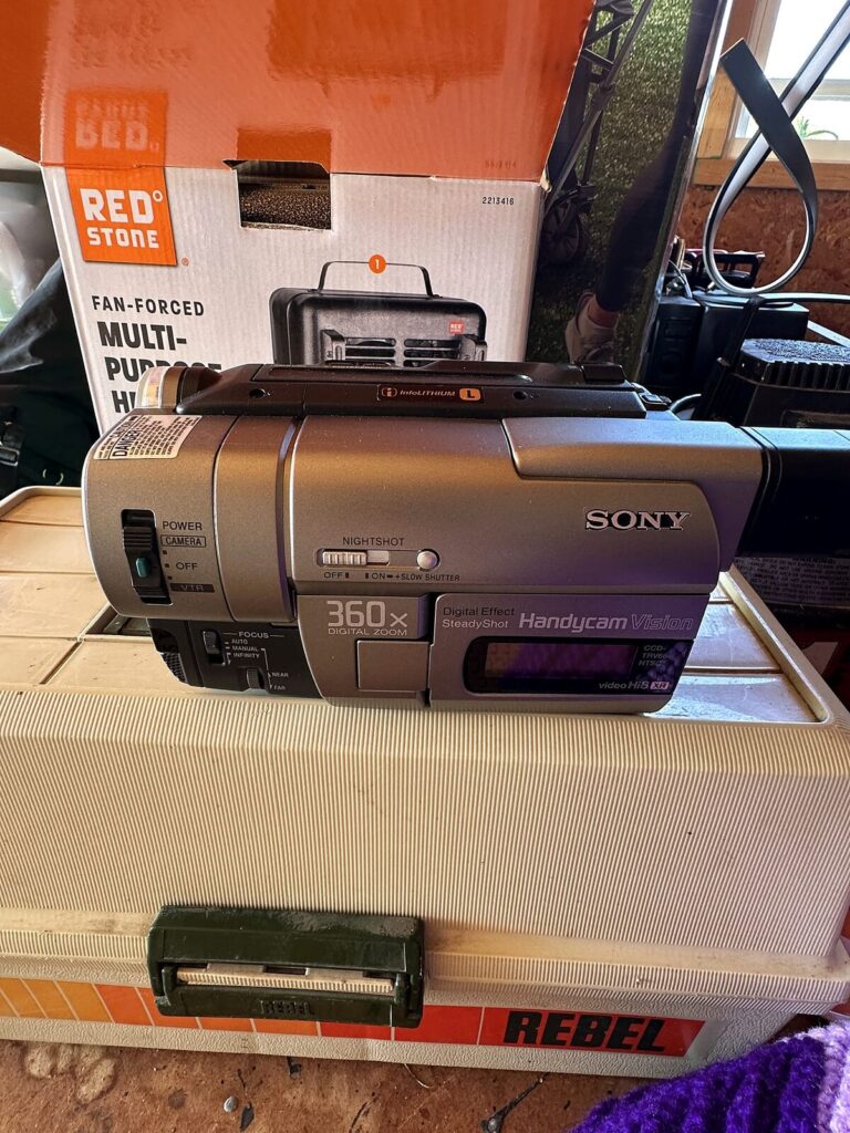 Sony Handycam camcorder, tackle box and Red Stone heater in box