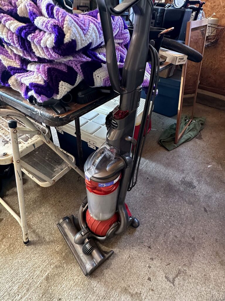 Dyson upright vacuum, afghan and step stool