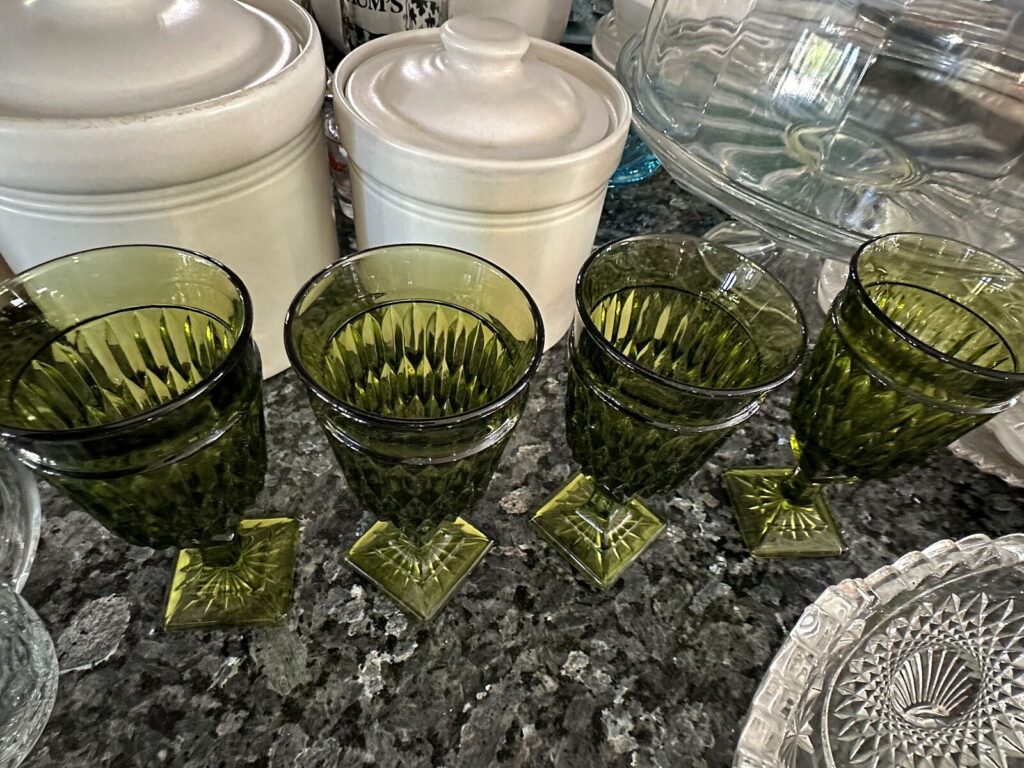 Green glass goblets and glass cake stand