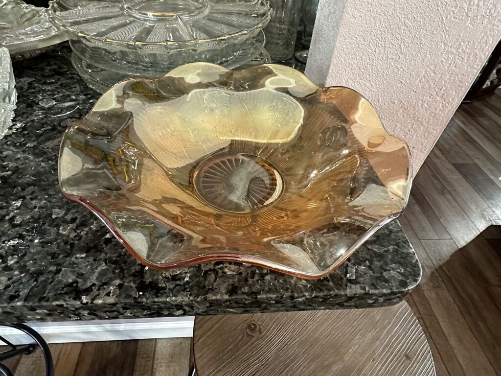 Iridescent ruffled glass bowl
