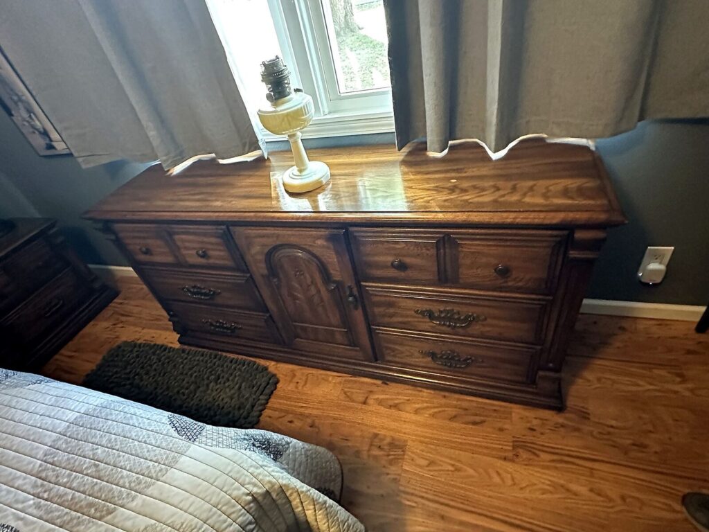 Matching carved triple dresser and Aladdin-style lamp